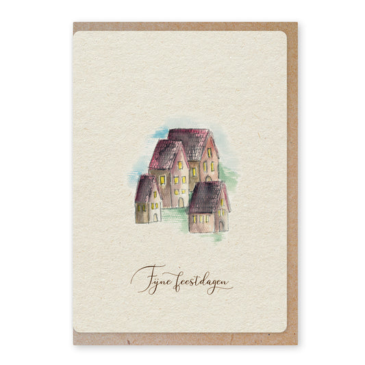 Een mooie duurzame enkele kaart met een tafereel van een kerstdorpje&nbsp;in aquarel voor een Kerstgroet of een Nieuwjaarswens. De illustraties zijn gemaakt in onze grafische studio. Gedrukt op Paperwise Naturel, boomvrij papier van landbouwrestafval.&nbsp;