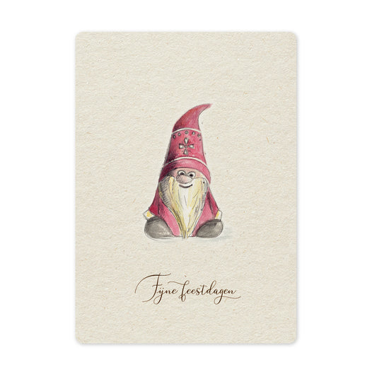 Een mooie duurzame enkele kaart met een tafereel van een tomte / kerstkabouter in aquarel voor een Kerstgroet of een Nieuwjaarswens. De illustraties zijn gemaakt in onze grafische studio. Gedrukt op Paperwise Naturel, boomvrij papier van landbouwrestafval.&nbsp;